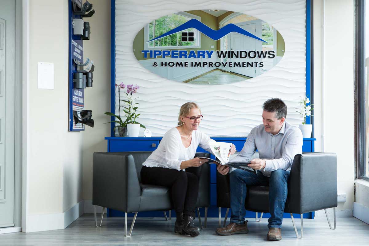 Tipperary Windows People Looking at Catalog